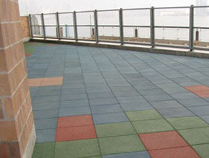 Interlocking Rubber Playground Tile with Safety Ramps - Rubber Co